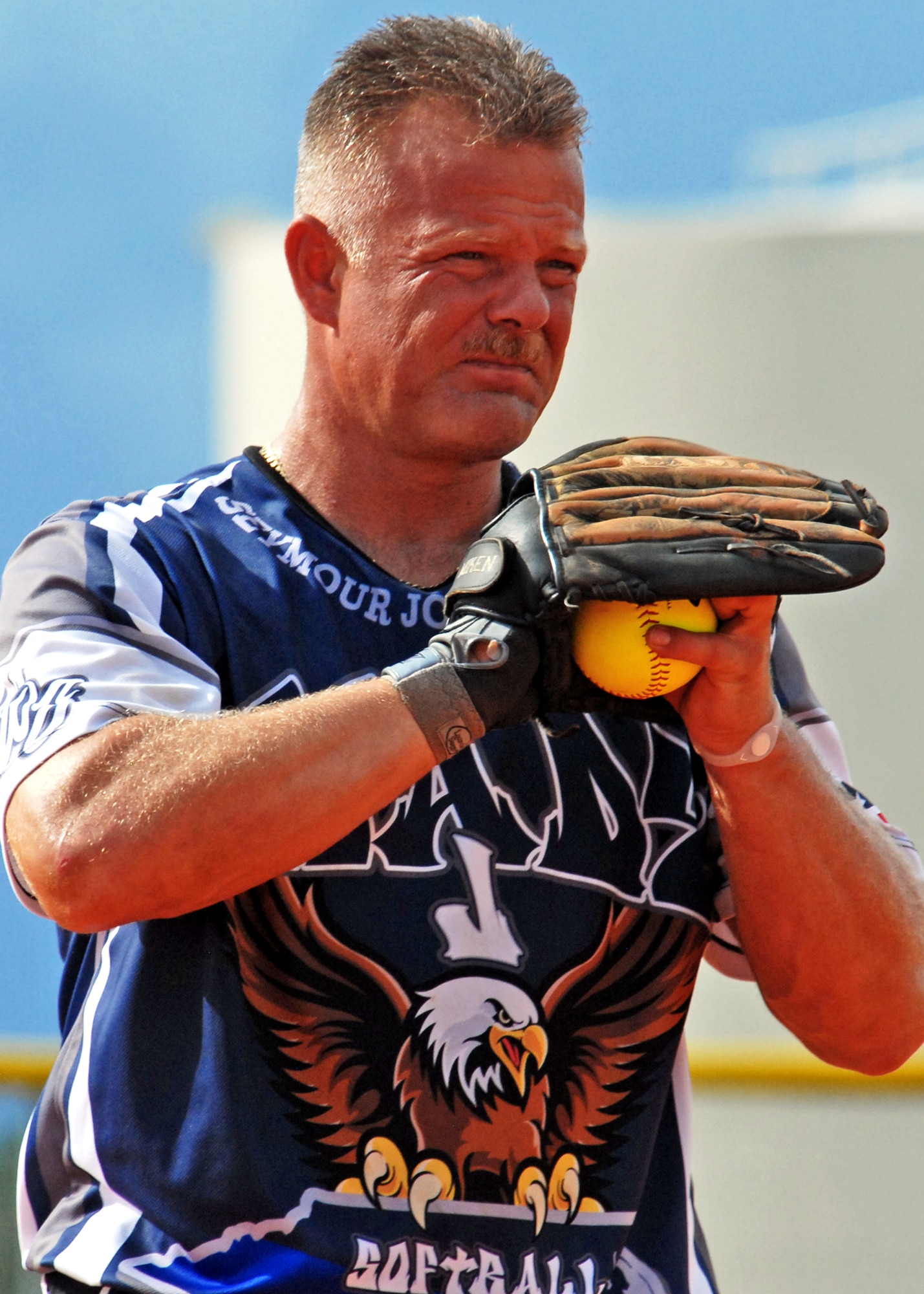 A player from Seymour Johnson Air Force Base, N.C., prepares to deliver a pitch during a practice game Aug. 27.  The Air Force Softball team began tryouts and practice last week at Eglin Air Force Base, Fla.  The head coach will sort through 26 players to fill the 14-man roster prior to competing in the Armed Forces Championship, Sept. 18-24.  The Air Force team won the championship last year.  (U.S. Air Force photo/Samuel King Jr.)
