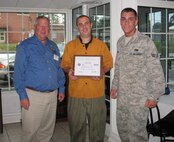 Ken Oppenheim (left) with North Carolina ESGR, presents a Patriot Award to Mr. Jonathan Schatz, employer of Senior Airman Austin Clark of the 916th Air Refueling Wing (Photo courtesy of NC ESGR)