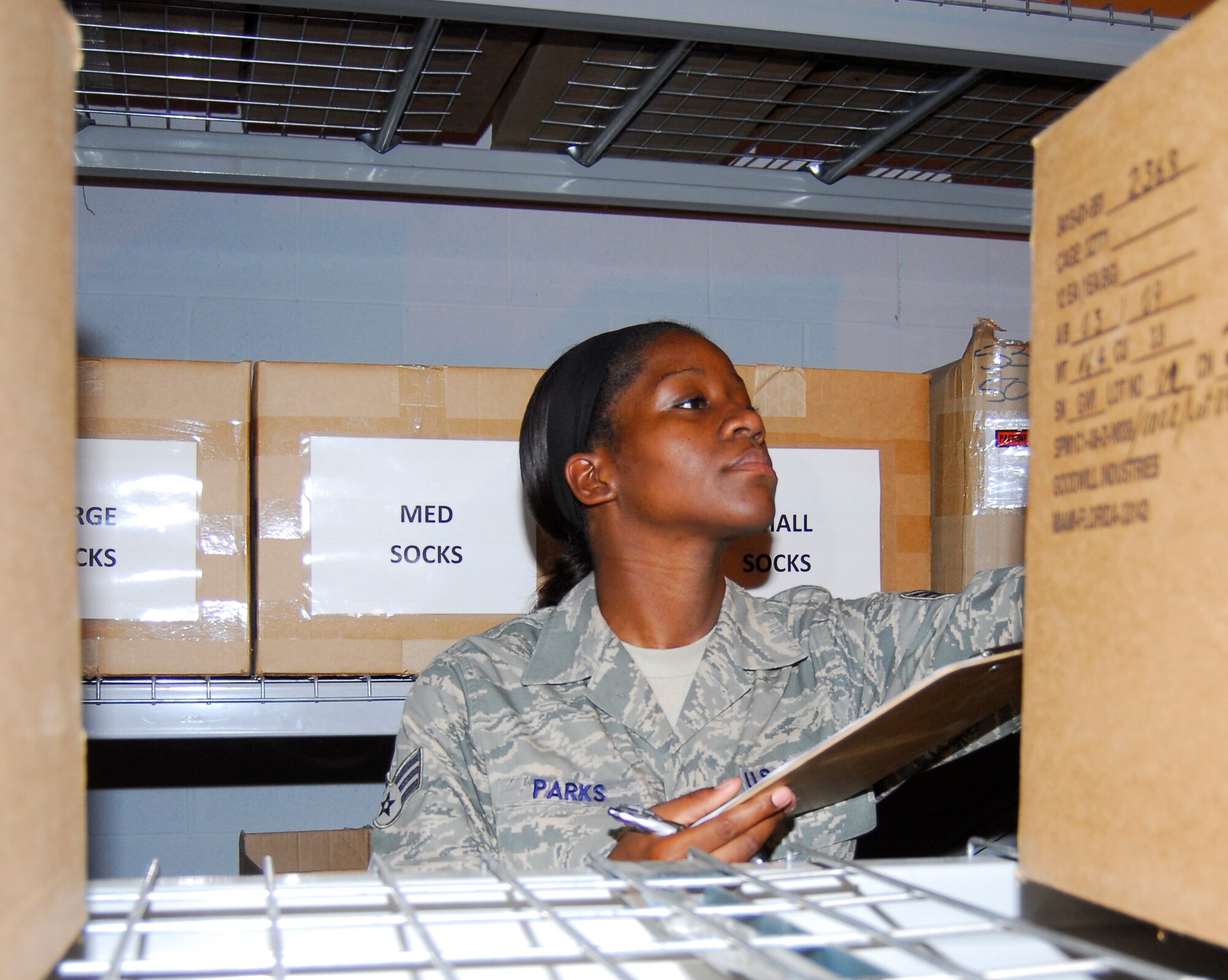 Senior Airman Candice Parks, 43rd Logistics Readiness Squadron Material Management Technician, takes inventory of equipment in the warehouse Aug. 25. (U.S. Air Force photo/Senior Airman Kris Levasseur)