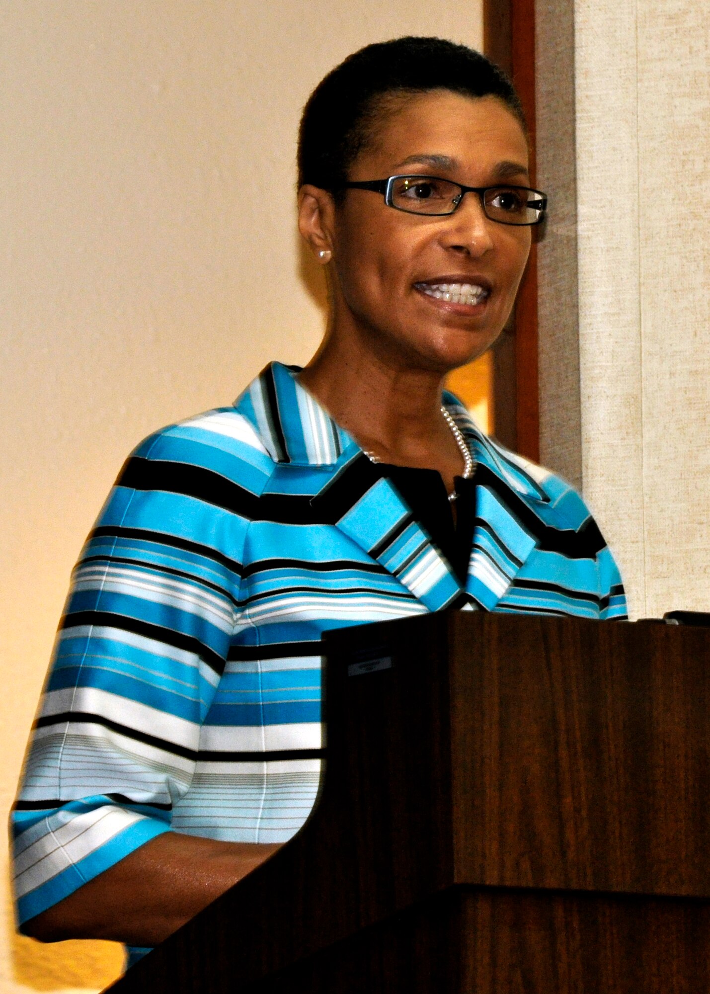 Dr. Joyce Gossom, Associate Dean at the University of West Florida, educates the Eglin community on the importance of celebrating their civil liberties at the Women's Equality Day program Aug. 26.   (U.S. Air Force photo/Wilton Glenn.)