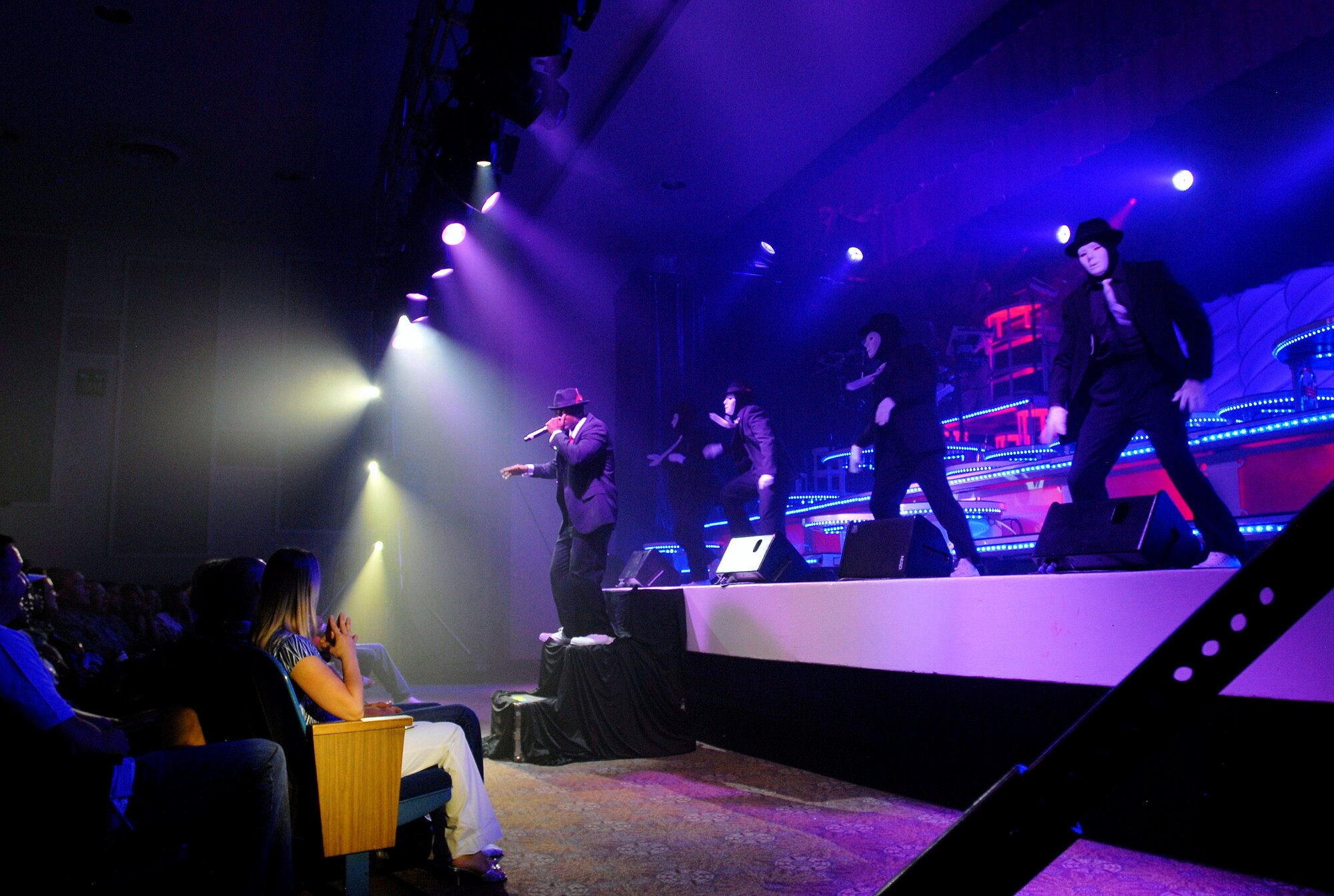 Staff Sergeant Antonio Howard, Tops in Blue vocalist with the 6th Security Forces Squadron MacDill Air Force Base, Fla., performs at the Peterson Air Force Base auditorium Aug. 20. (U.S. Air Force photo/Airman 1st Class Jessica Hines)