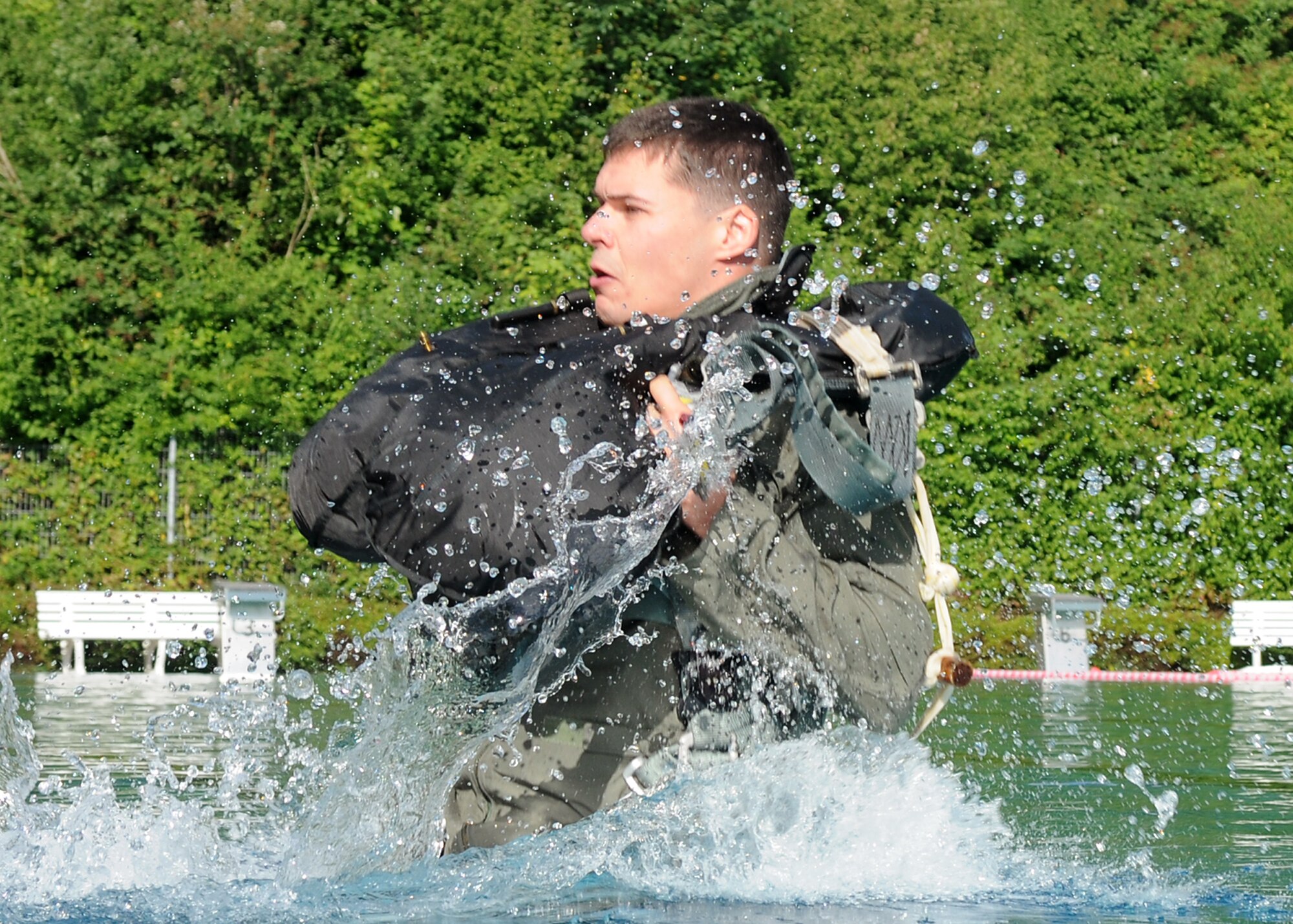 SPANGDAHLEM AIR BASE, Germany – Capt. Timothy Riley, 480th Fighter Squadron F-16 Fighting Falcon pilot, surfaces after a scenario designed to simulate being dragged in the water by a parachute during water survival training Aug. 20.  Water survival is one part of recurring survival, evasion, resistance and escape training and is tailored to conditions pilots from Spangdahlem might face flying over the North Atlantic Ocean.  (U.S. Air Force photo/Staff Sgt. Logan Tuttle)  