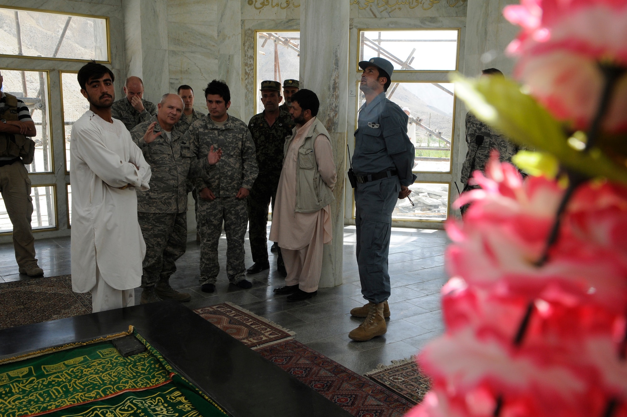 U.S. Air Force Maj. Gen. Charles W. Lyon, Director, Air Component Coordination Element, Air Forces Central Command, Kabul, Afghanistan, visits Ahmad Shah Massoud?s tomb during a recent visit to FOB Lion.  Massoud, who is commonly known as the ?Lion? of Panjshir was killed by a suicide bomber on Sep. 9, 2001. (U.S. Air Force Photo by: Tech. Sgt. Sean M. White, PRT Panjshir Photographer)