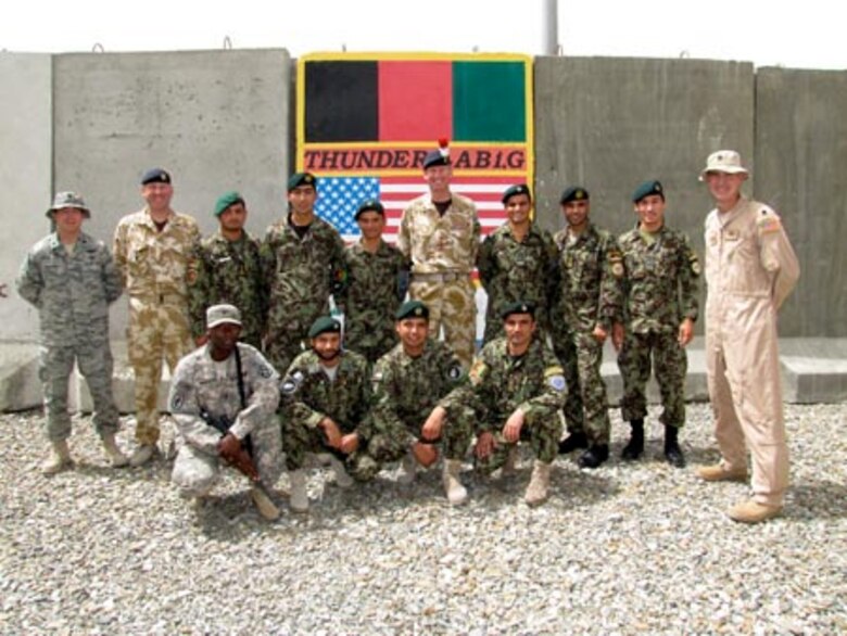 Brigadier David Paterson Commander Combined Training Advisory Group-Army tours the Afghan Air Force Thunder Lab in Kabul on August 28, 2010 (U.S. Navy photo by Mass Communications Specialist First Class Elizabeth Burke/RELEASED).