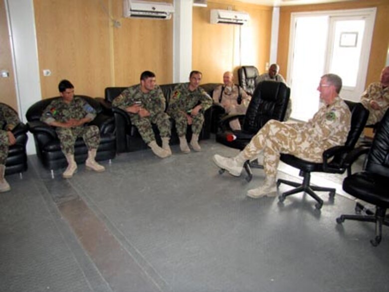 Brigadier David Paterson Commander Combined Training Advisory Group-Army tours the Afghan Air Force Thunder Lab in Kabul on August 28, 2010 (U.S. Navy photo by Mass Communications Specialist First Class Elizabeth Burke/RELEASED).