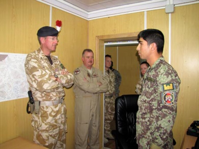 Brigadier David Paterson Commander Combined Training Advisory Group-Army tours the Afghan Air Force Thunder Lab in Kabul on August 28, 2010 (U.S. Navy photo by Mass Communications Specialist First Class Elizabeth Burke/RELEASED).