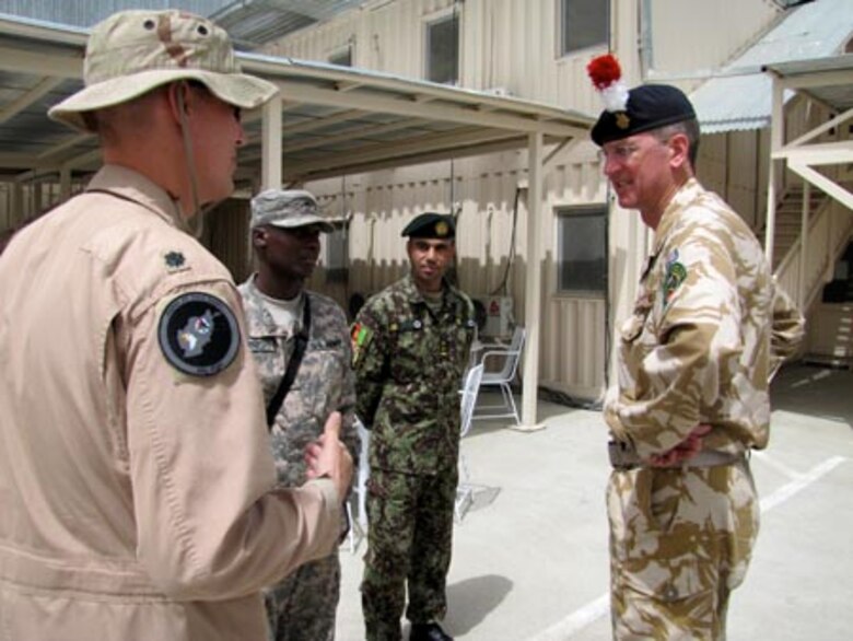 Brigadier David Paterson Commander Combined Training Advisory Group-Army tours the Afghan Air Force Thunder Lab in Kabul on August 28, 2010 (U.S. Navy photo by Mass Communications Specialist First Class Elizabeth Burke/RELEASED).