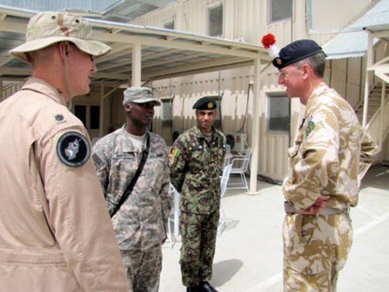 Brigadier David Paterson Commander Combined Training Advisory Group-Army tours the Afghan Air Force Thunder Lab in Kabul on August 28, 2010 (U.S. Navy photo by Mass Communications Specialist First Class Elizabeth Burke/RELEASED).