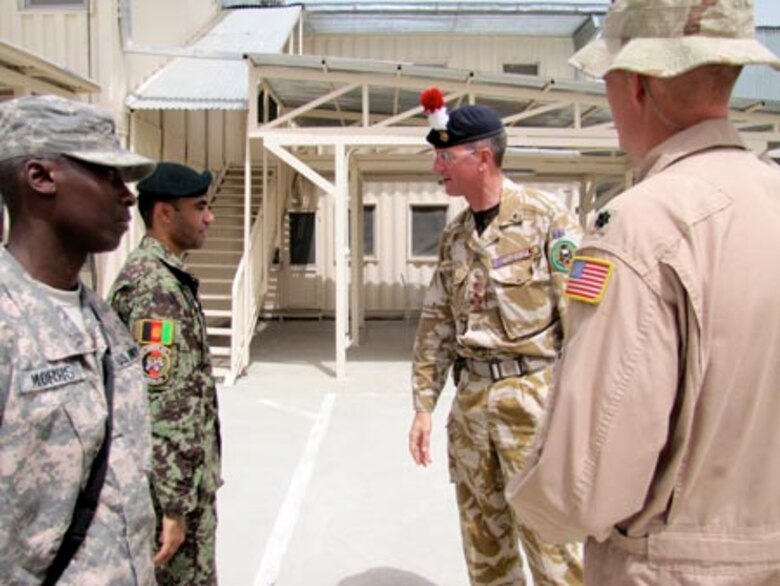 Brigadier David Paterson Commander Combined Training Advisory Group-Army tours the Afghan Air Force Thunder Lab in Kabul on August 28, 2010 (U.S. Navy photo by Mass Communications Specialist First Class Elizabeth Burke/RELEASED).