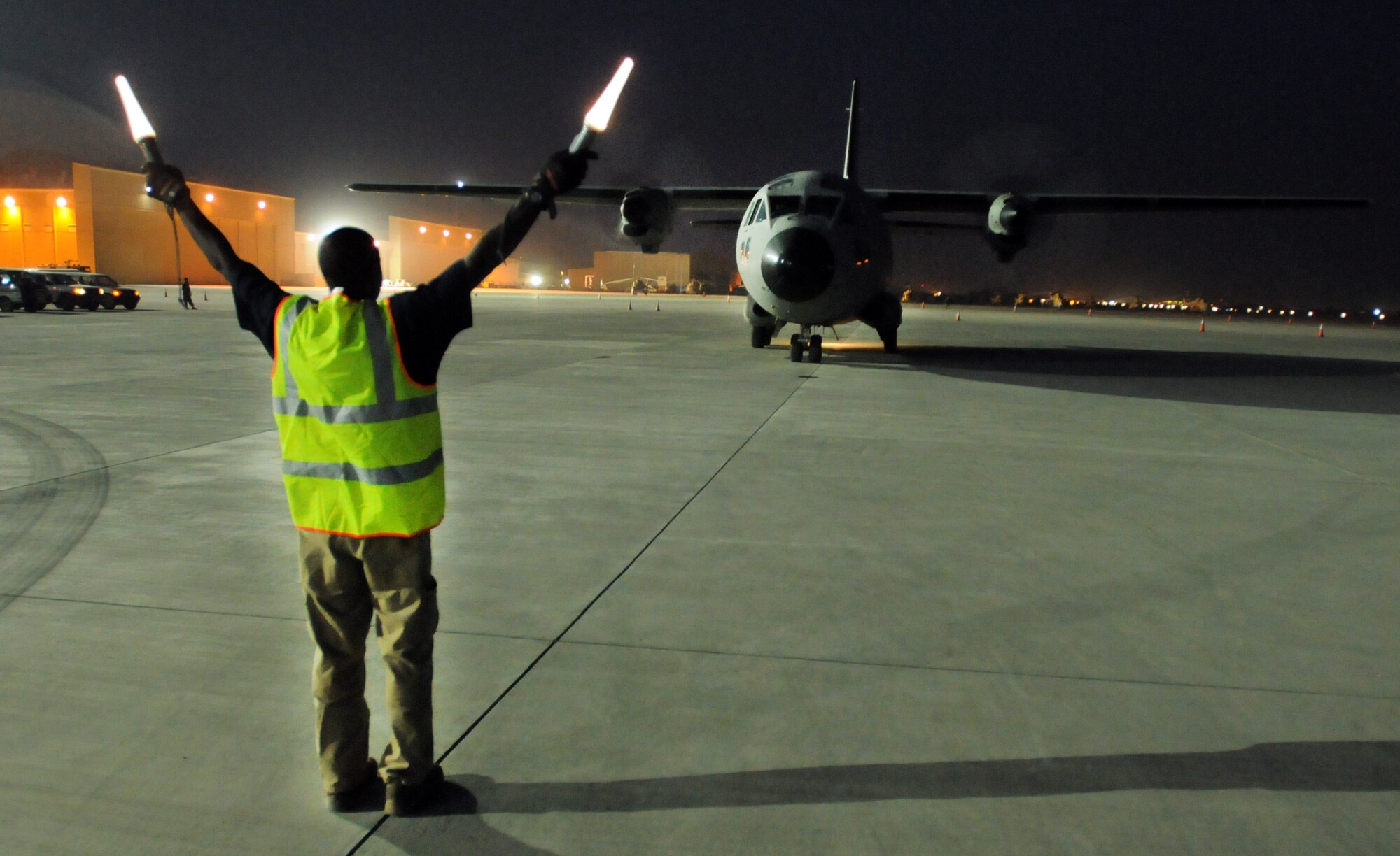 100830-N-6031Q-001 KABUL, Afghanistan -Brig. Gen. Michael Boera, Commanding General, 438th Air Expeditionary Wing, Combined Air Power Transition Force, presents a certificate of achievement to the crew of the C-27 Spartan fixed wing aircraft after its completion of 1000 hours of flight time in Afghanistan. The certificates were presented in a small ceremony on the flight line of the Afghan Air Force base in Kabul on Aug. 29, 2010. (US Navy photo by Mass Communication Specialist 2nd Class David Quillen/ RELEASED).