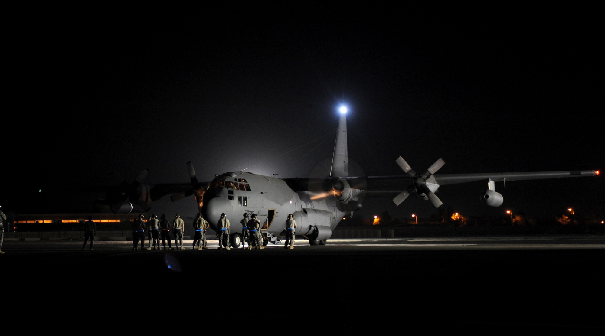 An EC-130H Compass Call assigned to the 43rd Expeditionary Electronic Combat Squadron is prepped for departure Aug. 29, 2010, I Southwest Asia. The plane's unit, the 43rd Expeditionary Electronic Combat Squadron, has been part of the 386th Air Expeditionary Wing for 6.5 years and is moving to another base in the U.S. Central Command area of responsibility because of the responsible drawdown of forces in Iraq. The EC-130H provides U.S. forces with the ability to jam enemy communications. (U.S. Air Force photo/Senior Airman Laura Turner)