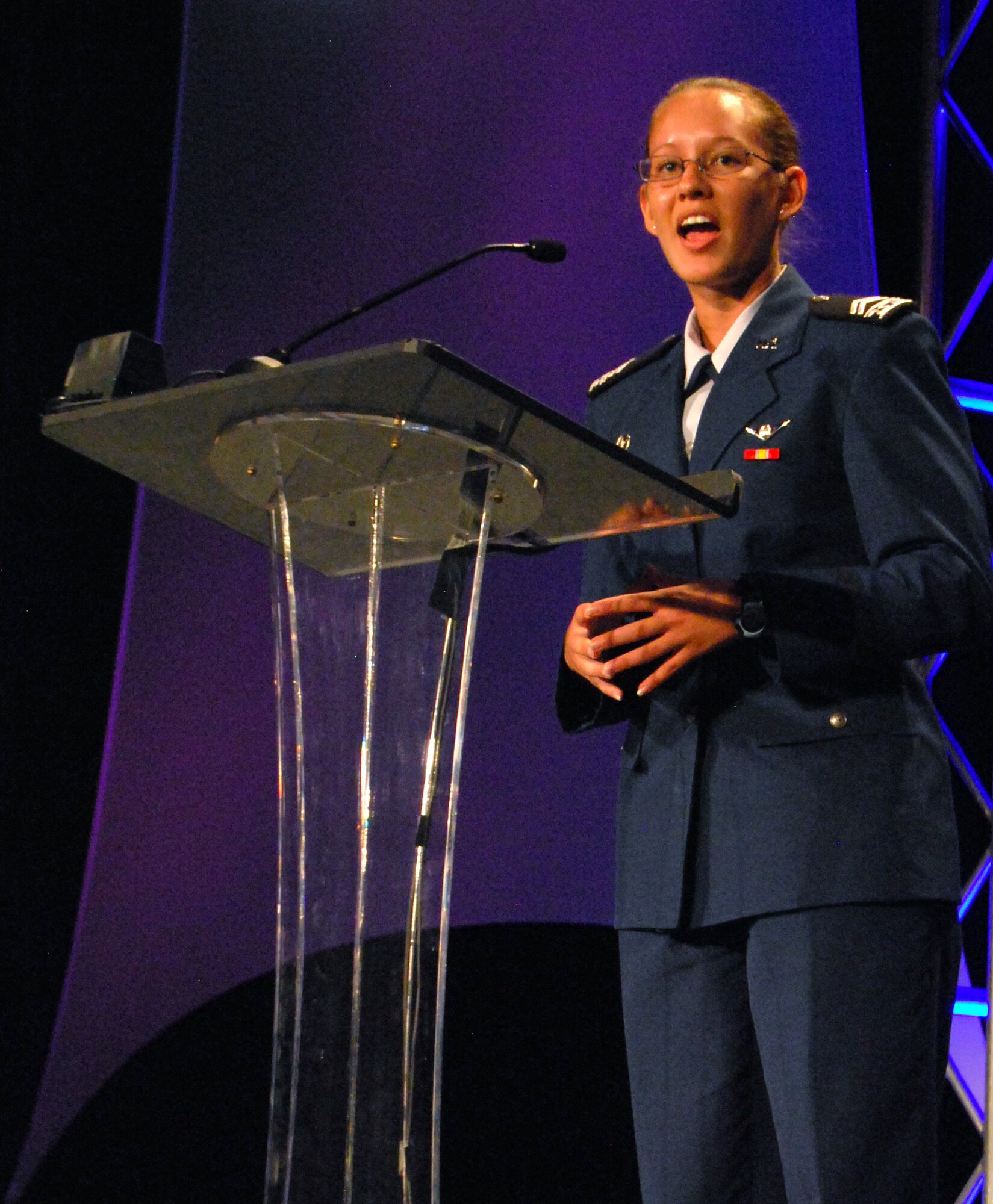 Cadet 2nd Class Christina England talks about the Air Force Academy's unmanned aerial systems airmanship program at the Unmanned Systems North America 2010 conference in Denver Aug. 27, 2010. The conference was hosted by the Association of Unmanned Vehicle Systems International in the Colorado Convention Center. Cadet England is a cadet UAS instructor pilot and Nashville native. (U.S. Air Force photo/Staff Sgt. Don Branum)