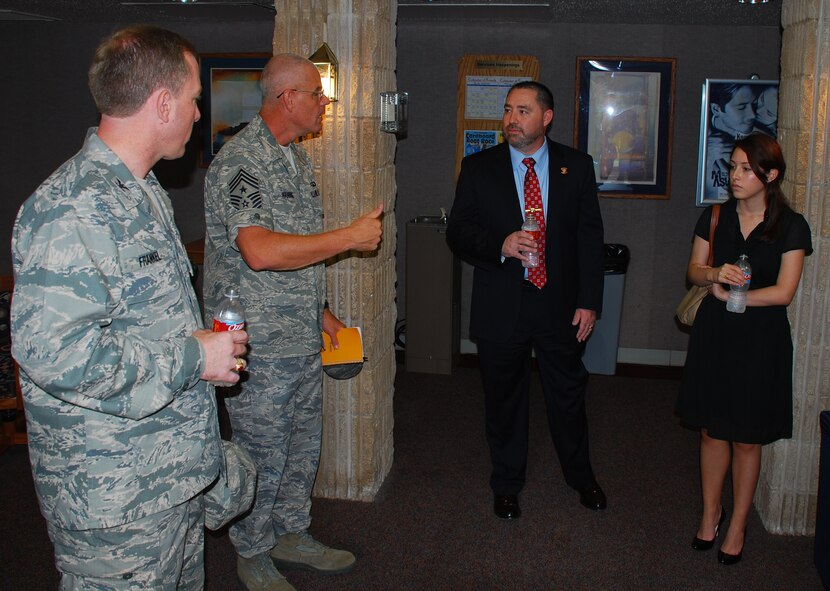 LAUGHLIN AIR FORCE BASE, Texas – Chief Master Sgt. Mike Hanning, 47th Flying Training Wing command chief,  explains the plan to remodel the day rooms of Laughlin’s enlisted dormitories to Erasmo Valles, a staffer from Congressman Ciro Rodriguez’s office, as Col. Michael Frankel, 47th Flying Training Wing commander, and Alissa Tovar, legislative assistant to Congressman Rodriguez, look on.  The team spent the morning of Aug. 27 touring numerous Laughlin facilities including the dorms, the Aircraft Maintenance Operations Center and the simulator building. (U.S. Air Force photos/Airman 1st Class Blake Mize)