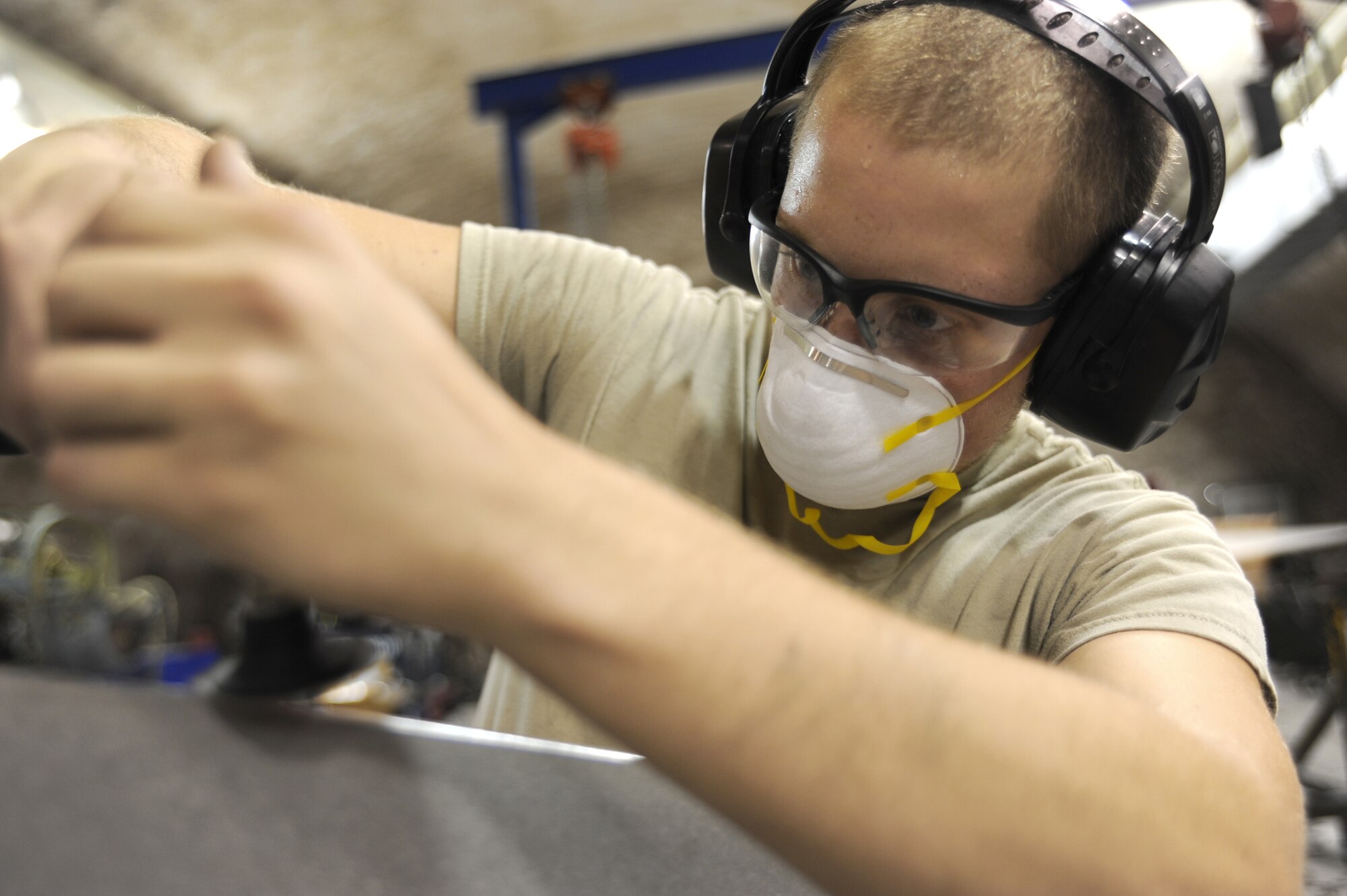 Senior Airman Corey Sites works on C-130 Hercules propeller blades Aug. 30, 2010, at a base in Southwest Asia.  Airman Sites is a jet engine mechanic with the 379th Expeditionary Maintenance Squadron and is deployed from Hurlburt Field, Fla. (U.S. Air Force photo/Senior Airman Katie Gieratz)