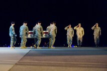 A U.S. Army carry team transfers the remains of Army Spc. Faith R. Hinkley, of Colorado Springs, Colo., at Dover Air Force Base, Del., August 9. Spc. Hinkley was assigned to the 502nd Military Intelligence Battalion, 201st Battlefield Surveillance Brigade, Joint Base Lewis-McChord, Wash.  (U.S. Air Force photo/Roland Balik)