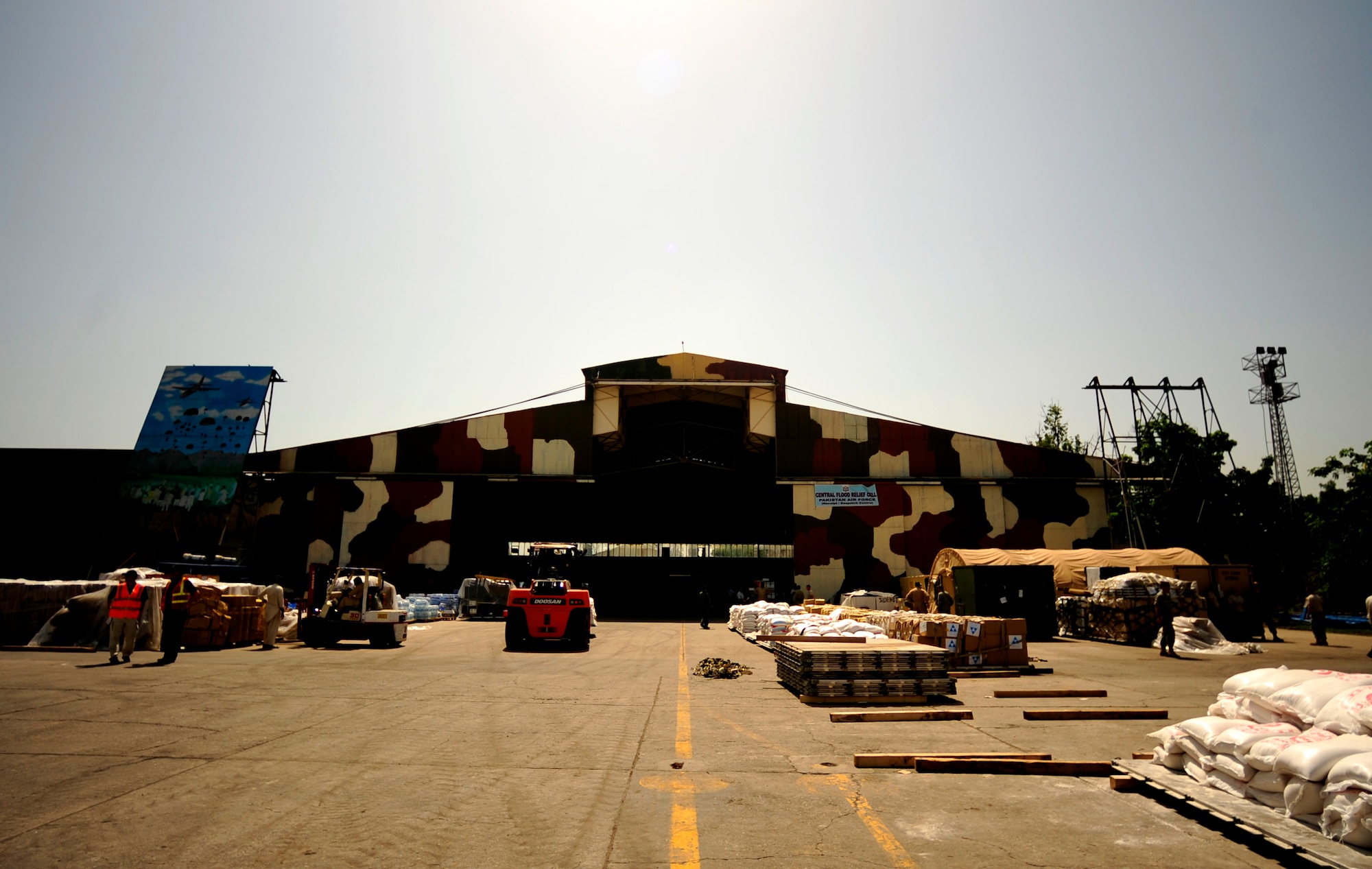 CHAKLALA AIR FORCE BASE, Pakistan – Overall shot of a hangar on Chaklala Air Base, Pakistan, the hub for all supplies coming into Pakistan in support of flood relief efforts on Aug. 28. The Contingency Reaction Element from the 818th Contingency Response Group, Joint Base McGuire-Dix-Lakehurst, N.J., arrived to take over responsibilities for loading and off loading U.S. aircraft with supplies all over Pakistan in support of flood relief efforts. (U.S. photo by Staff Sgt. Andy M. Kin) (released)