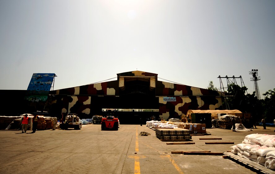 This is an overall shot of a hangar on Chaklala Air Base, Pakistan, on Aug. 28, 2010, which is the hub for all supplies coming into Pakistan in support of flood relief efforts. The Contingency Reaction Element from the 818th Contingency Response Group, Joint Base McGuire-Dix-Lakehurst, N.J., arrived to take over responsibilities for loading and off loading U.S. aircraft with supplies all over Pakistan in support of flood relief efforts. (U.S. Air Force Photo/Staff Sgt. Andy M. Kin)