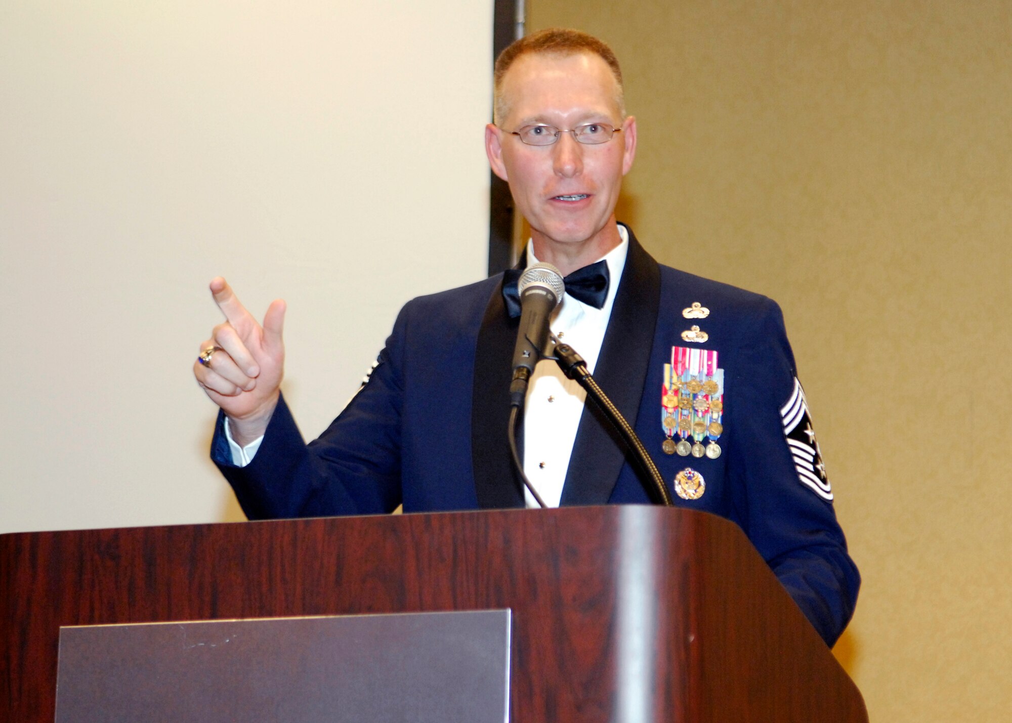AURORA, Colo. -- Command Chief Master Sgt. Richard Small, Air Force Space Command command chief, gives an inspirational speach to the new senior NCOs during the induction ceremony Aug. 27. (U.S. Air Force photo by Tech. Sgt. Shirley Henderson)
