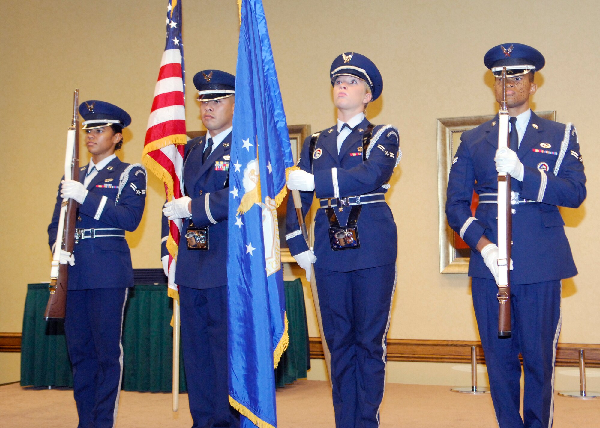 AURORA, Colo. -- Buckley Air Force Base's Mile HIgh Honor Guard presents the colors during the Senior NCO Induction Ceremony at the Crowne Plaza Hotel Aug. 27. (U.S. Air Force photo by Tech. Sgt. Shirley Henderson)
