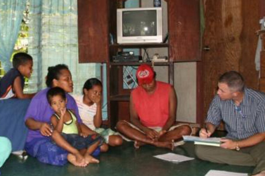 Lt Col (Dr.) Mark Duffy, Chief, Operational Support Section, Epidemiology Consult Service with the USAF School of Aerospace Medicine (USAFSAM) interviews a family on Yap Island in Micronesia as part of the investigation of an outbreak of the rare Zika virus.  The team’s results showed that 73 percent of the populations of the island were likely infected.   The paper published in the New England Journal of Medicine was recognized by the National Center for Emerging and Zoonotic Infectious Diseases (NCEZID) division of the Centers for Disease Control (CDC) as an outstanding paper in the field of assessment in Epidemiology on Aug 24, 2010.  (Air Force Photo)