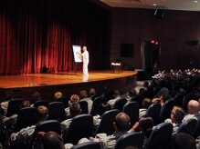 Comedian Steve Verret tallies up points for audience participation during his stand-up routine Aug. 26, 2010, on Joint Base Charleston, S.C. Mr. Verret engaged the audience with his Cajun flair and comedic talent, pitting sections of the audience against each other to vie for points on driving trivia and enthusiasm. Mr. Verret's routine fused his experience as a traffic safety instructor with stand-up comedy to educate Team Charleston on the simple yet statistically effective habits of safe driving. (U.S. Air Force photo/Airman 1st Class Ian Hoachlander)