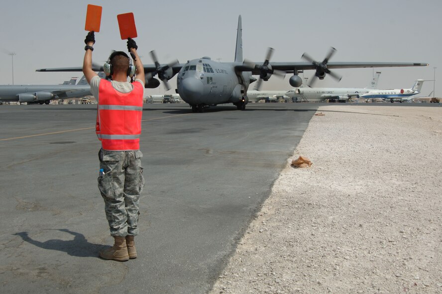 SOUTHWEST ASIA - Members of the 746th Expeditionary Airlift Squadron return to an undisclosed location Aug. 30, 2010, from Afghanistan, where they flew humanitarian relief missions to the Punjar Province in Pakistan. (U.S. Air Force photo/Tech. Sgt. Kimberly Spinner)