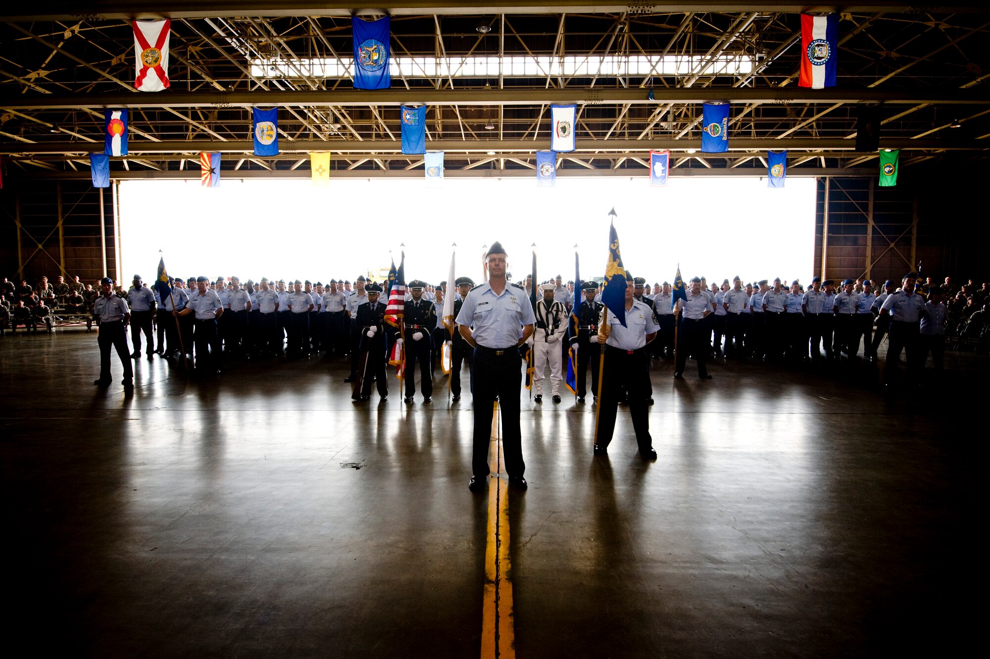 Air Force Col. Van Wimmer, 35th Fighter Wing vice commander, heads a formation of 35 FW service members during an assumption of command ceremony at Misawa Air Base, Japan, Aug. 31. During the ceremony, officiated by Air Force Lt. Gen. Edward A. Rice Jr., commander of U.S. Forces Japan and 5th Air Force, Air Force Col. Michael D. Rothstein became the new commander of installation and the 35th Fighter Wing. 