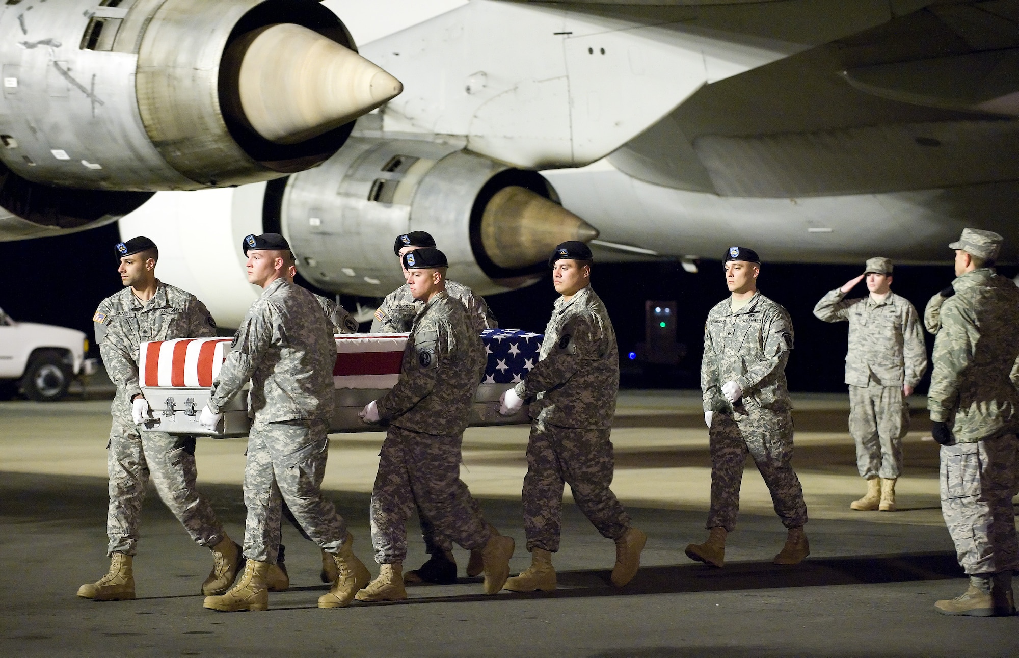 A U.S. Army carry team transfers the remains of Army Sgt. 1st Class Barry E. Jarvis of Tell City, Ind., at Dover Air Force Base, Del., Dec. 1, 2010.  Jarvis was assigned to the 1st Squadron, 61st Cavalry Regiment, 4th Brigade Combat Team, 101st Airborne Division (Air Assault), Fort Campbell, Ky. (U.S. Air Force photo by Jason Minto)