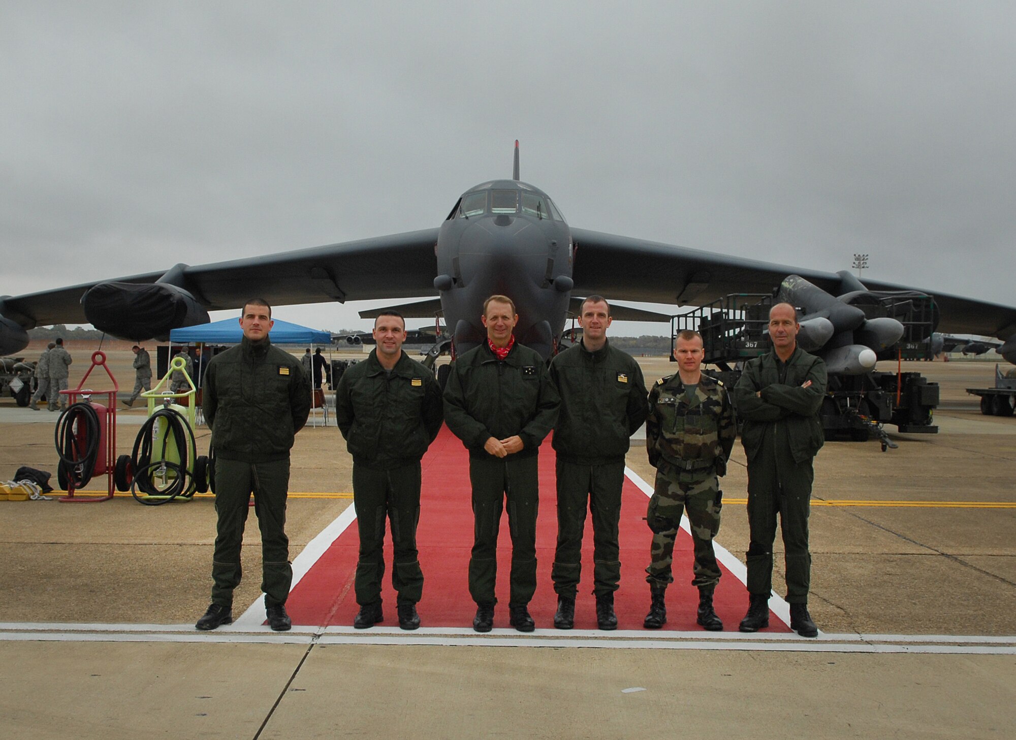 BARKSDALE AIR FORCE BASE, La. -- Lt. Gen. Paul Fouilland (center), French Strategic Air Forces commander-in-chief, and a delegation of French military officers pose in front of a B-52 bomber at Barksdale Air Force Base, La. during their visit Nov. 14-18. The visit was part of a dialogue between the two nations’ strategic air forces, intended to build on commonalities and strengthen ties between the nations’ respective deterrence forces. (U.S. Air Force photo/Master Sgt. Corey A. Clements)