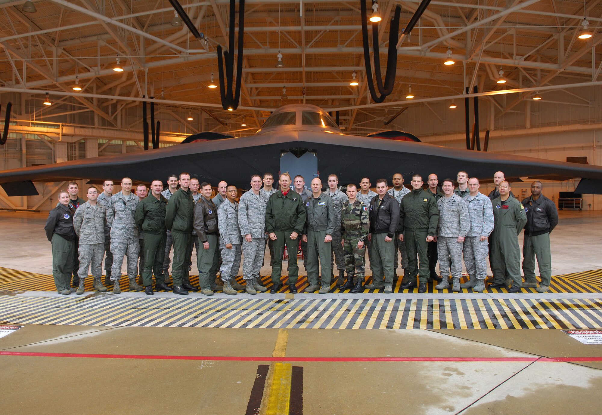 BARKSDALE AIR FORCE BASE, La. -- Lt. Gen. Paul Fouilland (center), French Strategic Air Forces commander-in-chief, and a delegation of French military officers pose in front of “The Spirit of Louisiana” B-2 bomber with Air Force Global Strike Command staff, and aircrew and maintenance personnel from the 509th Bomb Wing at Whiteman Air Force Base, Mo. The visit was part of a dialogue between the two nations’ strategic air forces, intended to build on commonalities and strengthen ties between the nations’ respective deterrence forces. (U.S. Air Force photo/Master Sgt. Corey A. Clements)