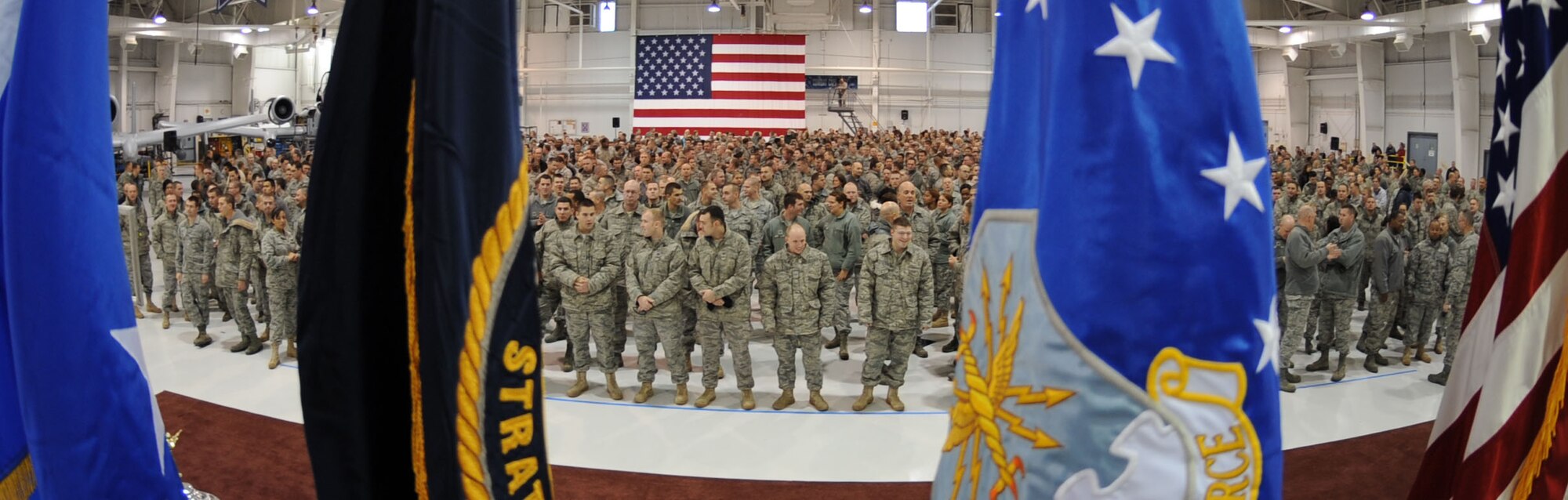 WHITEMAN AIR FORCE BASE, Mo. - A view through the flags as Officers and Airman await the arrival of Gen. Kevin Chilton, U.S. Strategic Command commander, at the 509th Bomb Wing All-Call, Dec. 1. General Chilton's speech focused on the importance of Air Force Global Strike Command and nuclear deterrence. (U.S. Air Force base photo by Senior Airman Carlin Leslie) (Released)
 


