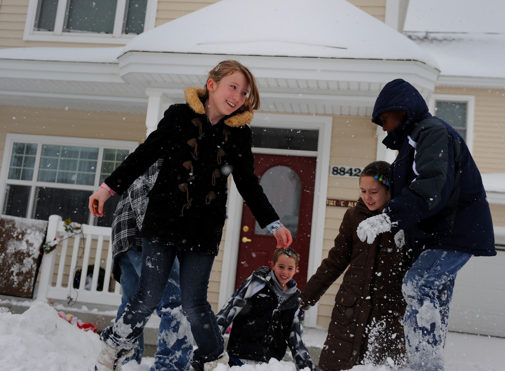 MOUNTAIN HOME AIR FORCE BASE, Idaho -- Children play in the snow in a base housing subdivision Dec. 1.  The base and local schools were closed due to the excessive accumulation of snow over the last 12 hours. (U.S. Air Force photo by Staff Sgt. Gina Chiaverotti-Paige) 
