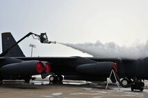 MINOT AIR FORCE BASE, N.D. -- Member of the 5th Aircraft Maintenance Squadron, de-ice the wings of a B-52H Stratofortress here Dec. 1. Maintenance on these aircraft is essential in keeping Air Force Global Strike Command’s assets combat ready 24/7 worldwide. (U.S. Air Force photo/Senior Airman Michael J. Veloz)