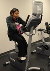 MINOT AIR FORCE BASE N.D. -- Payal Mehta, 5th Force Support Squadron youth management trainee uses a stationary bike at the McAdoo Fitness Center here Dec. 1. Exercise is one of the keys ways to fight weight gain during the cold weather season. (U.S. Air Force photo/Airman 1st Class Aaron-Forrest Wainwright)
