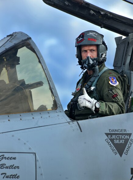 MOODY AIR FORCE BASE, Ga. -- Maj. Dylan Thorpe, A-10 East Demonstration Team pilot, gives his thumbs up to spectators of his certification flight Nov. 30. Amongst the spectators were his wife, daughter, wing commander, demo team members and civilians. (U.S. Air Force photo/Airman 1st Class Joshua Green)(RELEASED)
