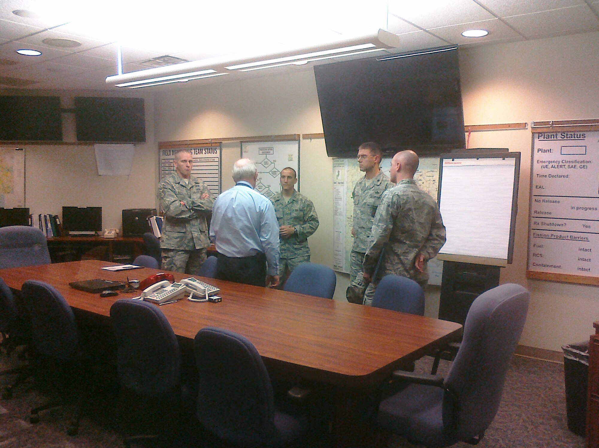 Dover Air Force Base, Del., Emergency Support Function members receive a briefing on command section operations Nov. 17, 2010, in the Delaware Emergency Management Agency Emergency Operations Center. (U.S. Air Force courtesy photo/Released)