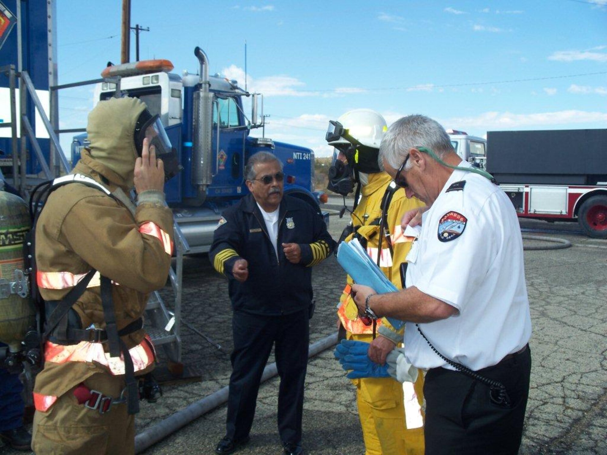 Chief Joe Ybarra, 95th Air Base Wing Fire Department, gives tactical instructions during structural live fire training conducted in October. Chief Ybarra will retire at the end of December after 45 years of service to the United States government. (Courtesy photo)
