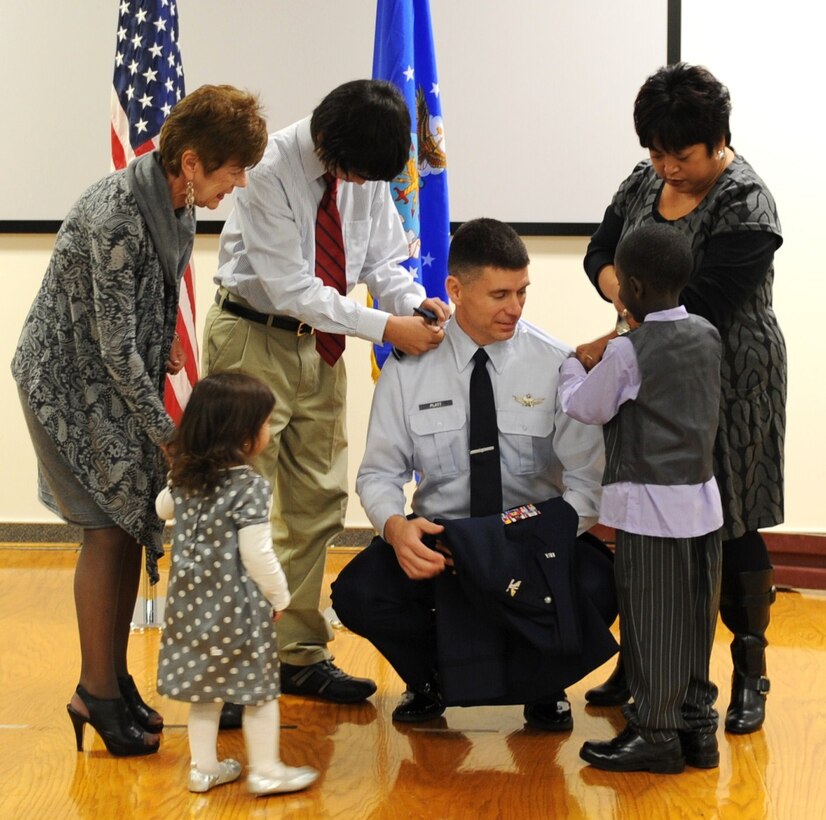 Lt. Col. Michael H. Platt, Air Force Research Laboratory Detachment 7 commander, is officially promoted to colonel during a ceremony at AFRL’s Rocket Science Center, Nov. 30. Colonel Platt had his family pin on his new rank in front of AFRL staff and Edwards leadership. He has commanded AFRL’s Edwards detachment since July. (Air Force photo by Ron Fair)