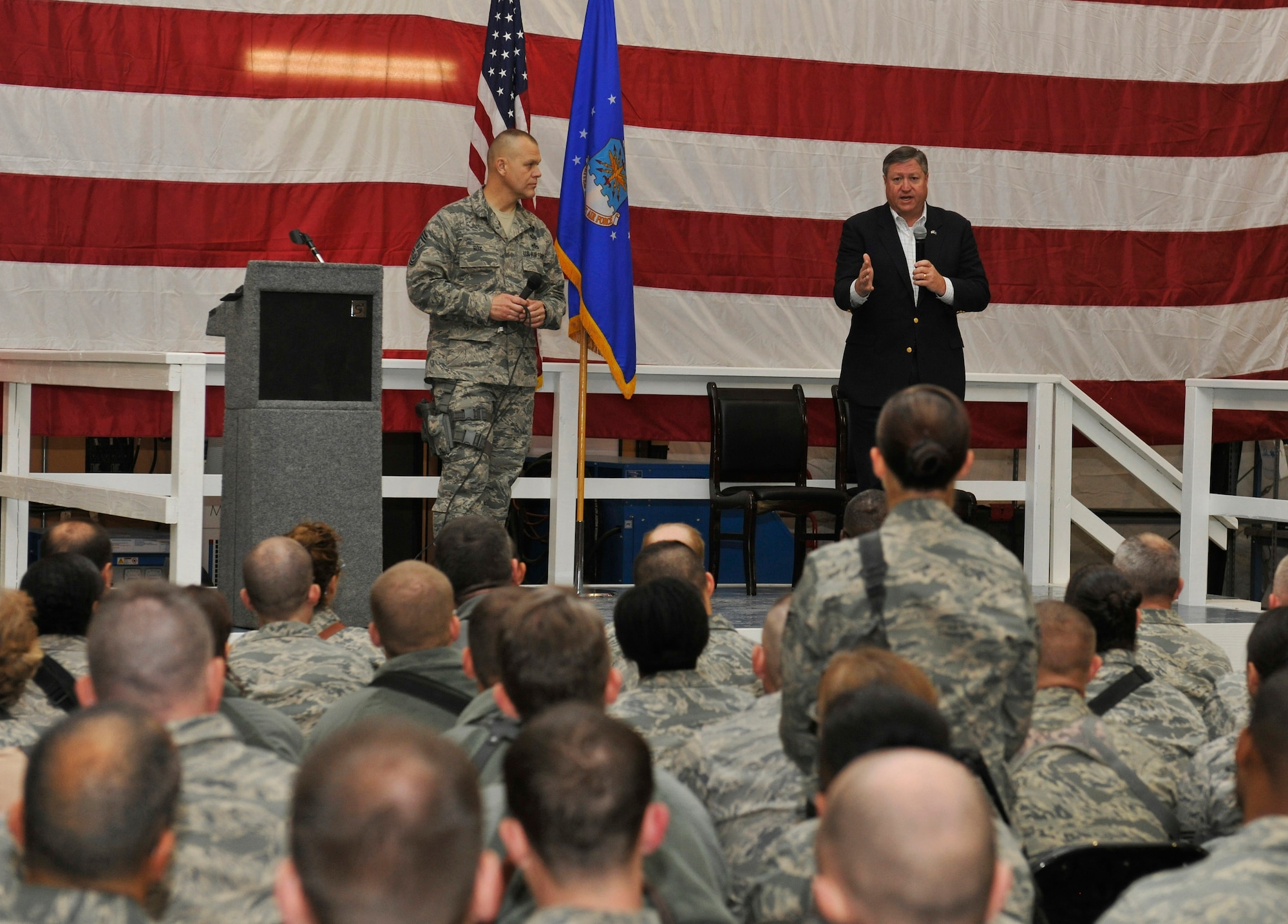 Secretary of the Air Force Michael Donley and Chief Master Sgt. of the Air Force James Roy answer questions from Airmen about the future of the Air Force and Afghanistan during an Airman's Call at Bagram Airfield, Afghanistan, November 26, 2010. Secretary Donley and Chief Master Sgt. Roy met with Airmen and Soldiers in Iraq and Afghanistan over Thanksgiving weekend. (U.S. Air Force photo/Staff Sgt. Christopher Boitz)
