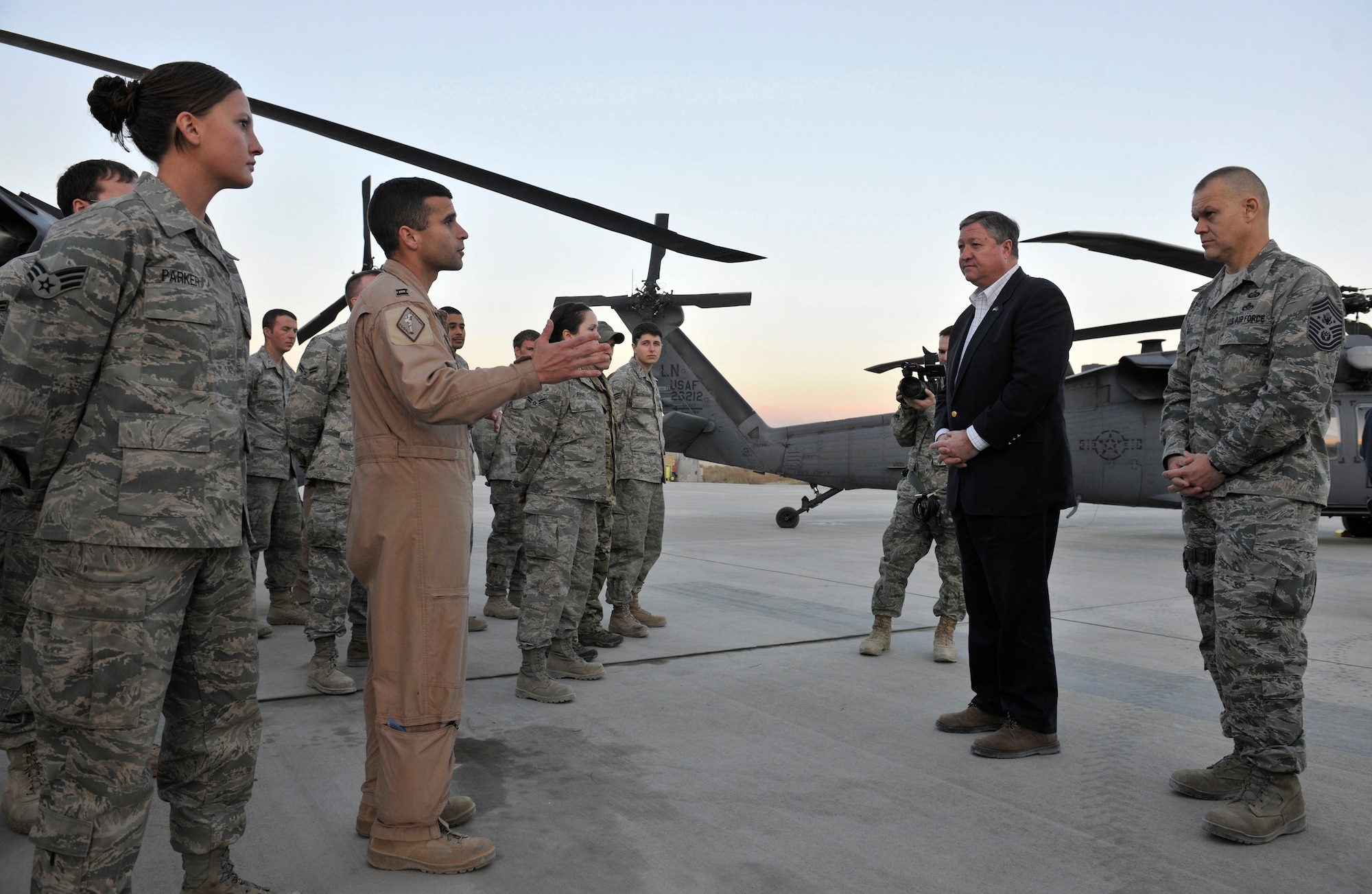 Secretary of the Air Force Michael Donley and Chief Master Sgt. of the Air Force James Roy speak with Airmen assigned to the 83rd Expeditionary Rescue Squadron about the squadron?s success during his visit to Bagram Airfield, Afghanistan, November 26, 2010. The 83rd ERS is a combat search and rescue squadron. Secretary Donley and Chief Master Sgt. Roy met with Airmen and Soldiers in Iraq and Afghanistan over Thanksgiving weekend. (U.S. Air Force photo/Staff Sgt. Christopher Boitz)