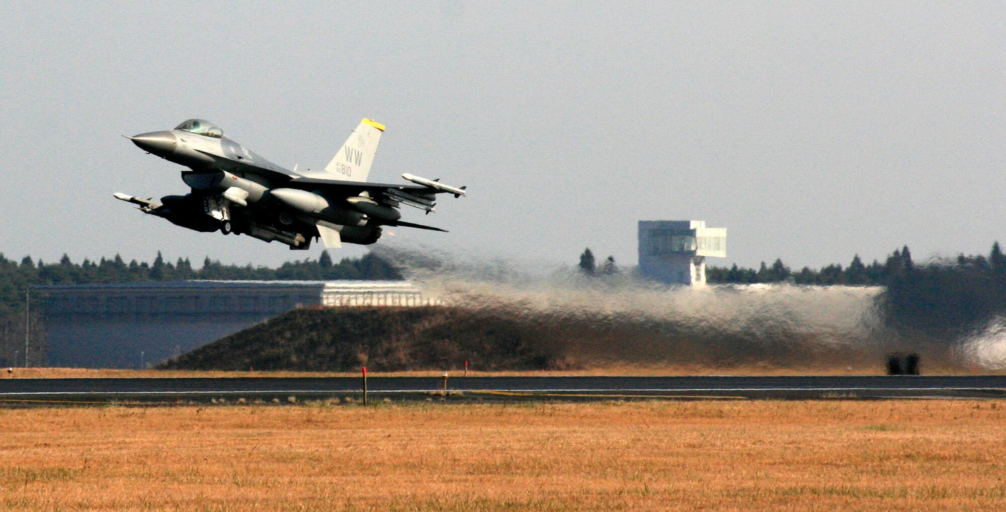 An F-16 Fighting Falcon from the 35th Fighter Wing takes off at Misawa Air Base, Japan, Nov. 21, 2010. The sortie launched in support of exercise Keen Sword, a bilateral training exercise involving U.S. and Japanese military members. Keen Sword is a regularly scheduled exercise that aims to strengthen Japan-U.S. military interoperability and increase readiness to respond to varied crisis situations. The field training exercise is scheduled Dec. 3-10 and is the tenth join-bilateral field training exercise since 1986 involving Japan Self Defense Forces and the U.S. military. (U.S. Air Force photo by Master Sgt. Mat Nisotis/Released)