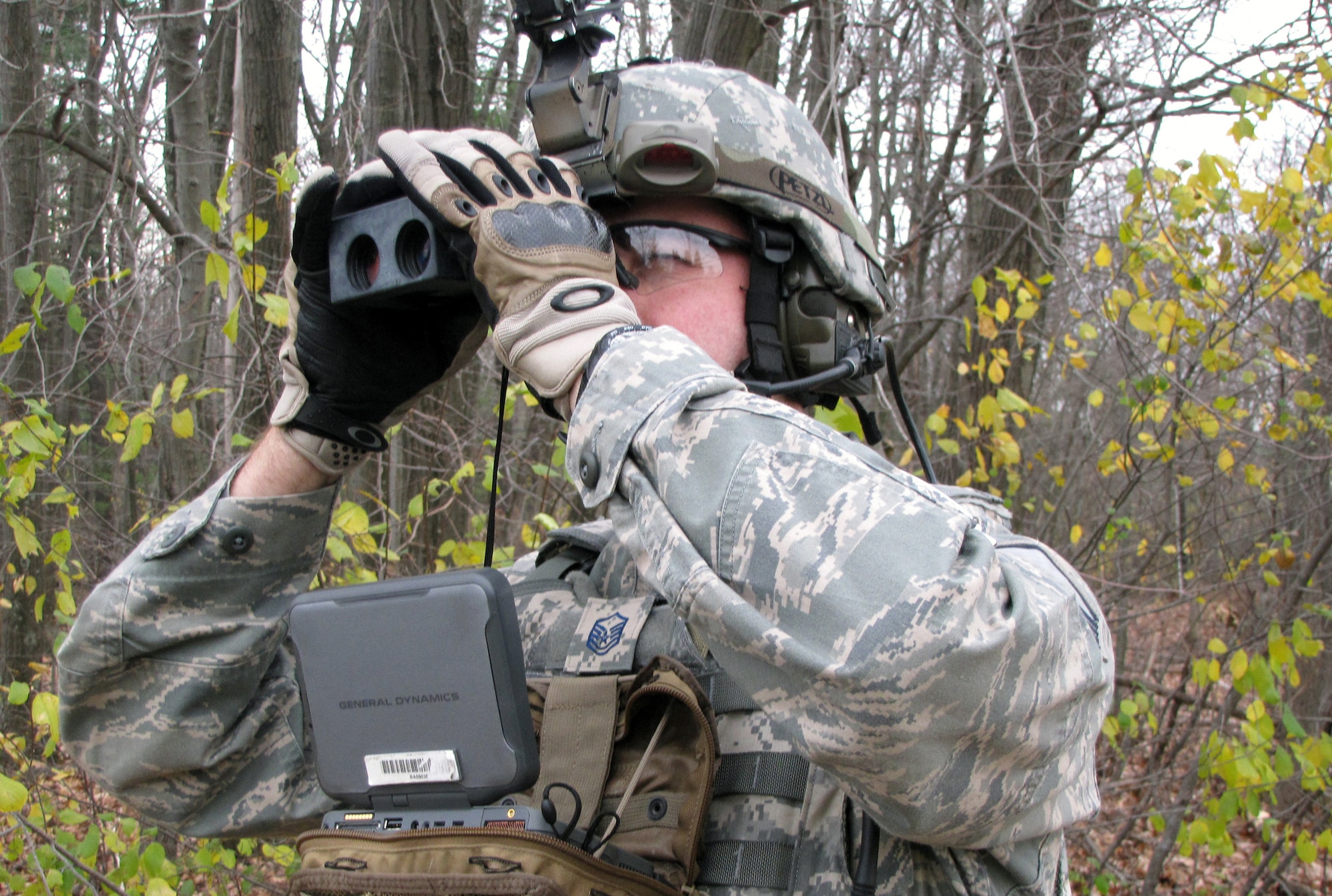 Master Sgt. Chris Spann demonstrates use of the Small Wearable Computer equipped with the latest version of the close air support software. Sergeant Spann is a joint tactical air controller assigned to the Tactical Air Control Party-Modernization Office at the Electronic Systems Center. (Courtesy photo)