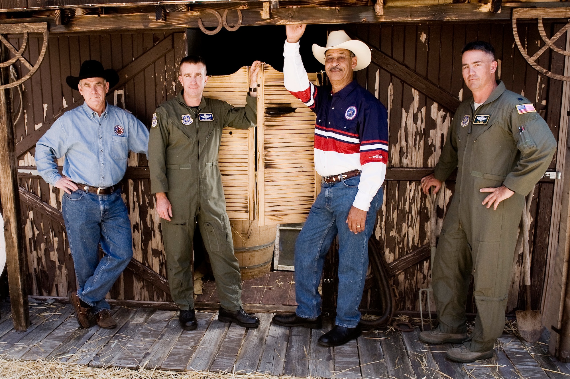 Jonathan Harris poses with fellow Air Mobility Command Rodeo staff members in 2009 at McChord Field, Joint Base Lewis-McChord, Wash. (U.S. Air Force photo/Abner Guzman)