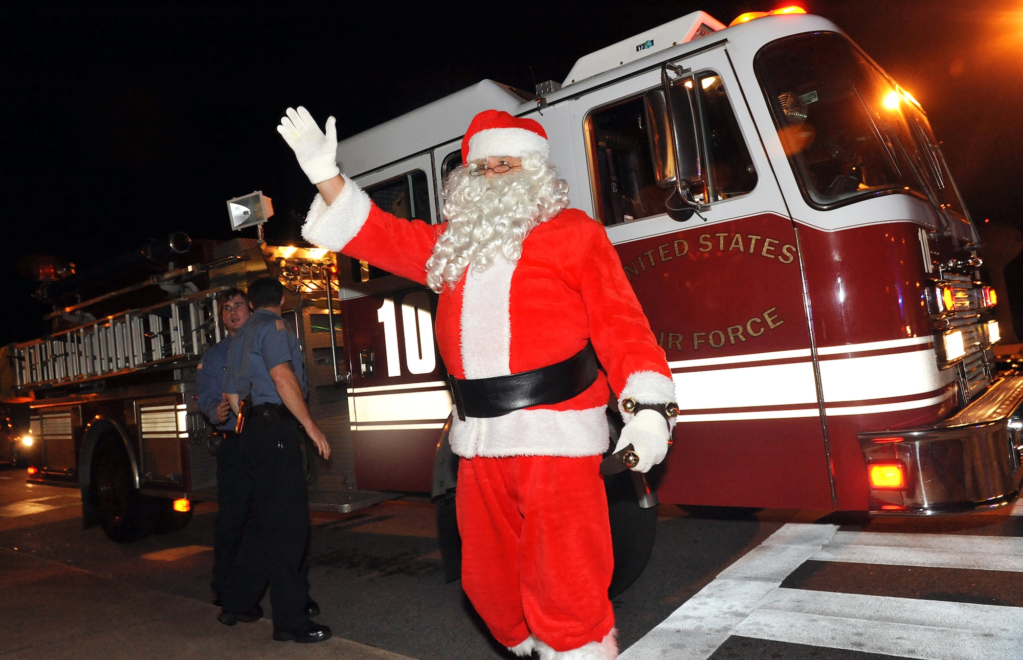 Santa Claus arrives at the annual Christmas Tree and Menorah Lighting Ceremony Nov. 30. U. S. Air Force photo by Tommie Horton