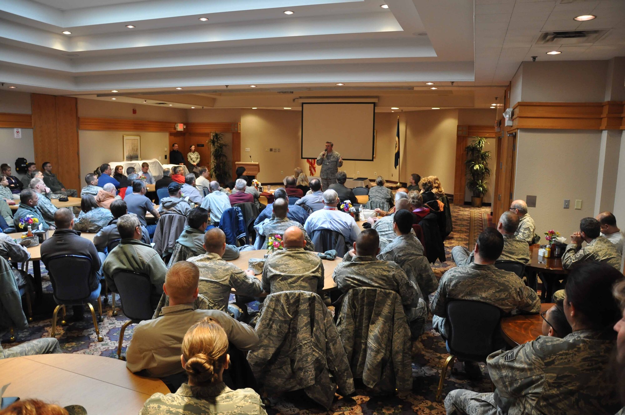 Colonol Darrell Young, 934th Airlift Wing Commander speaks to a packed house at his first civilan commanders call(Air Force Photo/TSgt Bob 