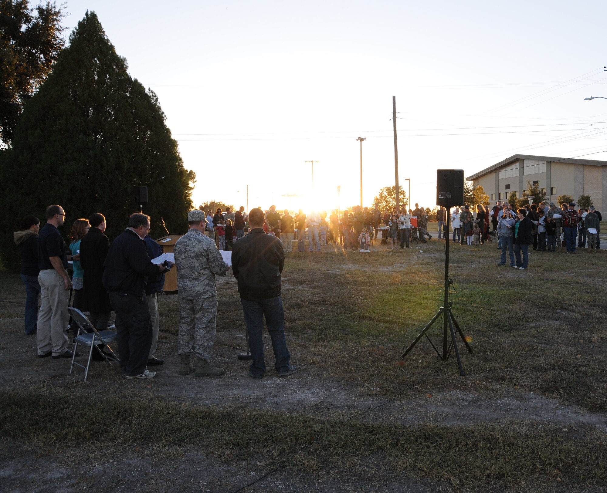 LAUGHLIN AIR FORCE BASE, Texas – Laughlin members sing Christmas carols just before Laughlin’s Christmas tree was lit Dec. 1. The tree lighting was followed by Dinner with Santa where children were able to meet Santa and express their Christmas wishes. (U.S. Air Force photo by Airman 1st Class Blake Mize)