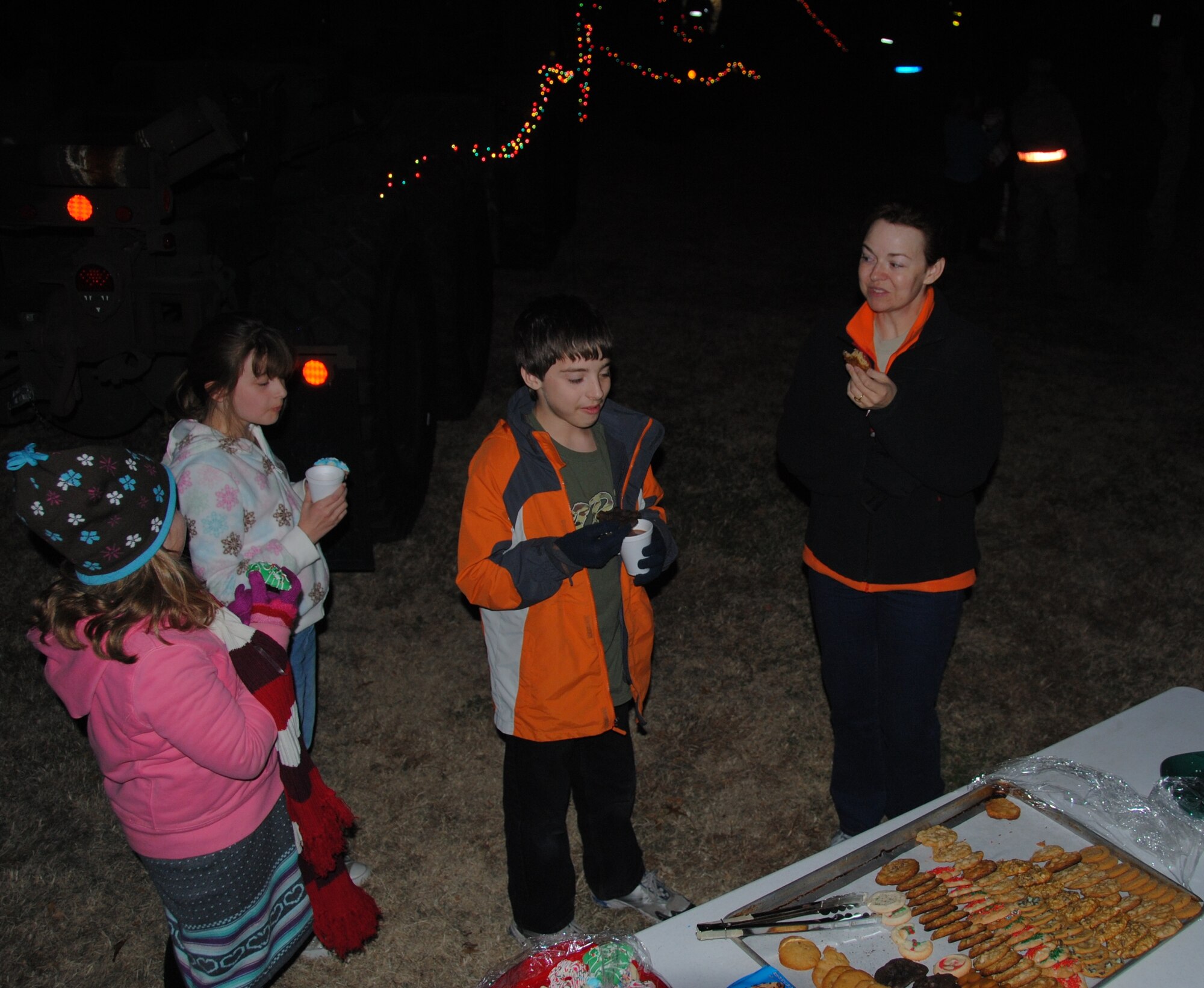 Members of the Vance community gathered near the front gate to participate in the Wing Tree Lighting Ceremony Thursday, Dec. 1, 2010. The event showcased many displays and activities as well as military vehicles decked out in holiday cheer. (U.S. Air Force photo/Senior Airman Wes Carter)  