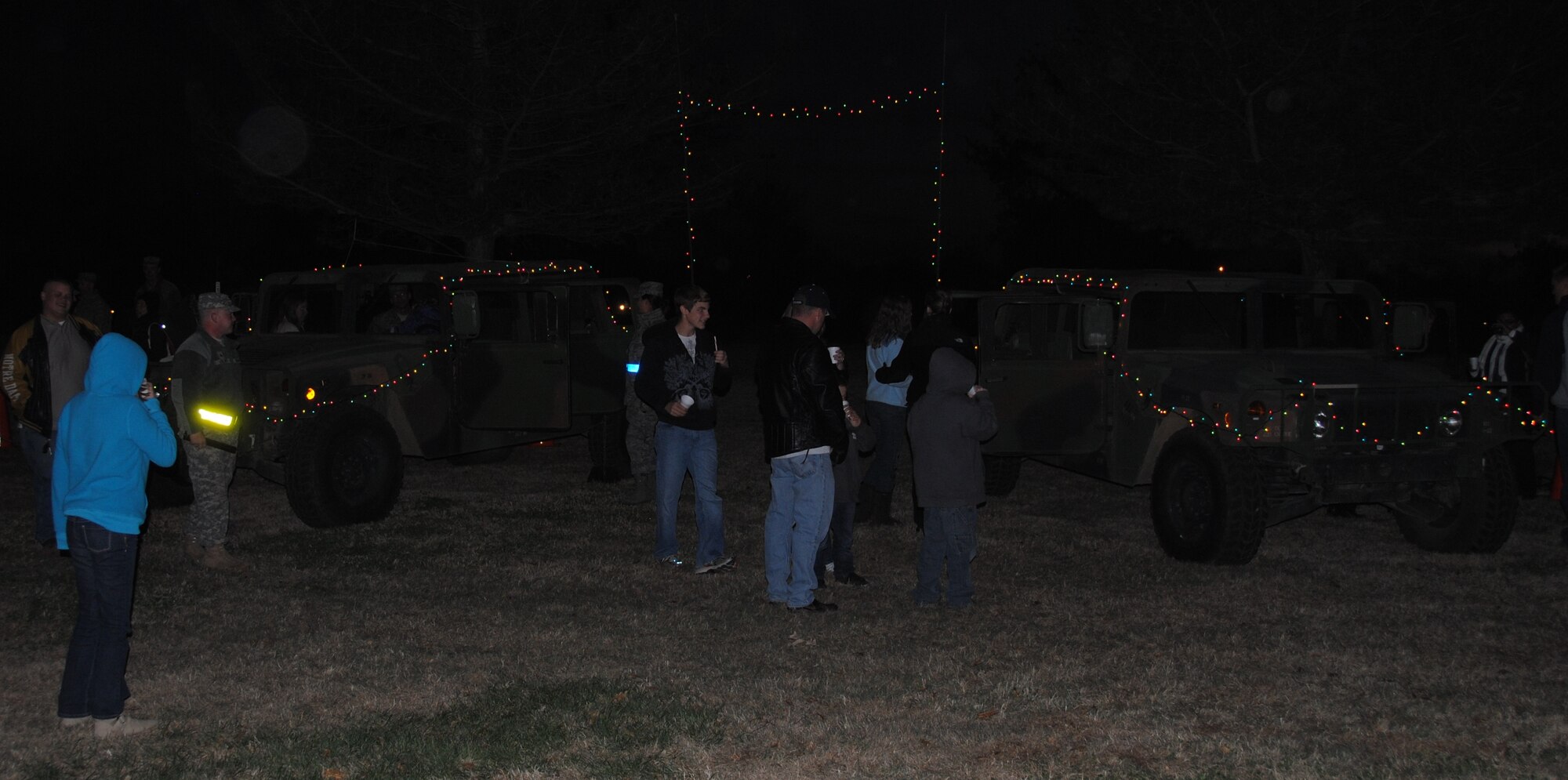 Members of the Vance community gathered near the front gate to participate in the Wing Tree Lighting Ceremony Thursday, Dec. 1, 2010. The event showcased many displays and activities as well as military vehicles decked out in holiday cheer. (U.S. Air Force photo/Senior Airman Wes Carter)  
