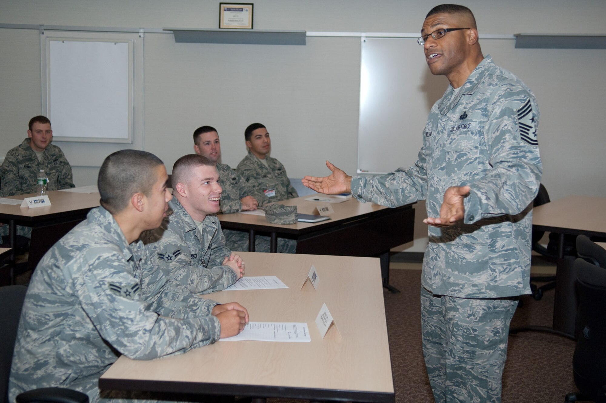 HANSCOM AIR FORCE BASE, Mass. – Chief Master Sgt. Kenneth Williams, Electronic Systems Center command chief, speaks to Airmen about leadership at the First Term Airman’s Center on Nov. 16. The week-long course teaches first-term Airmen at Hanscom about the many base resources available to help them have a successful Air Force career. Airmen attend the class within the first 60 days upon arriving to their first duty section. (U.S. Air Force photo by Rick Berry)