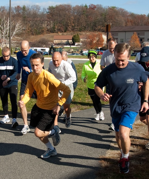 HANSCOM AIR FORCE BASE, Mass. – Runners take off for the Turkey Trot 5K Fun Run behind the Fitness and Sports Center on Nov. 17. Rick Janson was the overall male winner, with a time of 21:59. Heidi Brockmann was the overall female winner with a time of 25:42. (U.S. Air Force photo by Rick Berry)